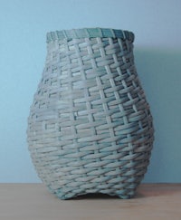 a wicker basket sitting on a table
